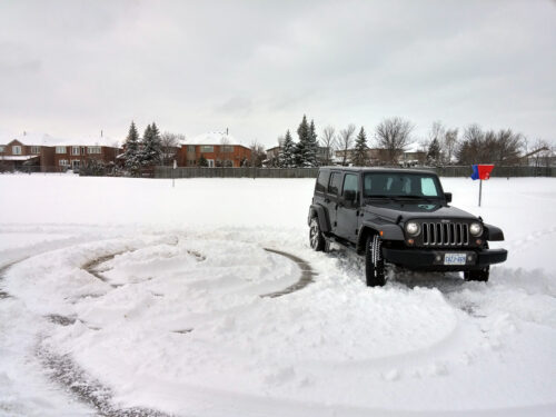 Jeep Wrangler Unlimited making circles in the snow