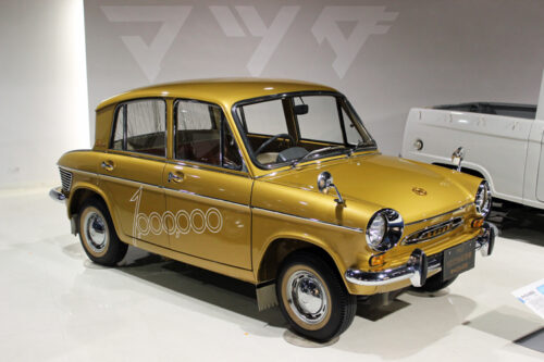 Gold Mazda Carol