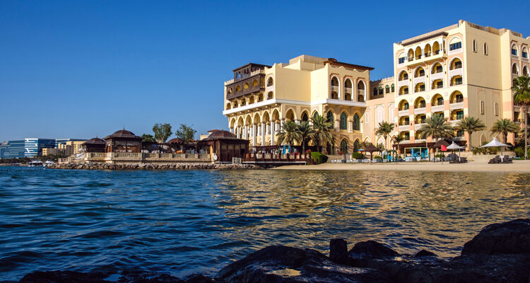 Exterior view of Shangri-La Qaryat Al Beri in Abu Dhabi overlooking the water and Sheikh Zayed Grand Mosque